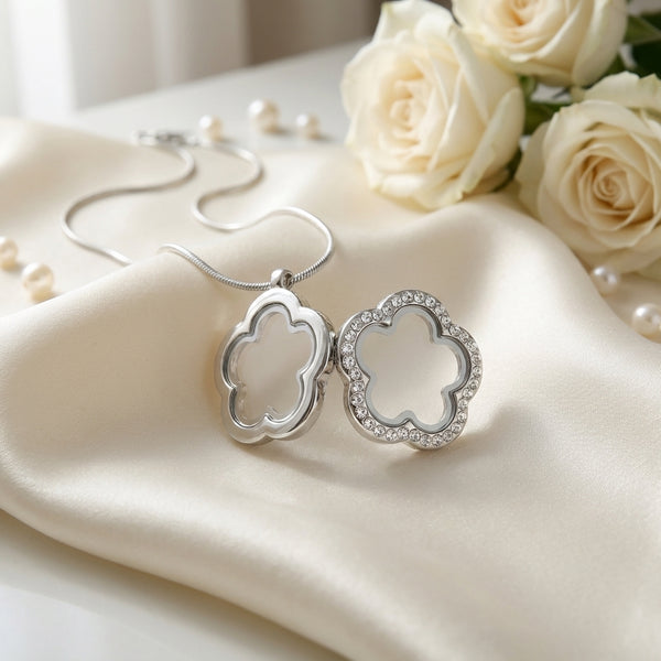 Silver clover flower shaped floating charm locket in open position