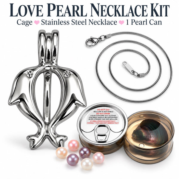 A dolphin cage necklace with stainless steel chain coiled up. Featureing two cans of love pearls with loose pearls in various colors scattered.
