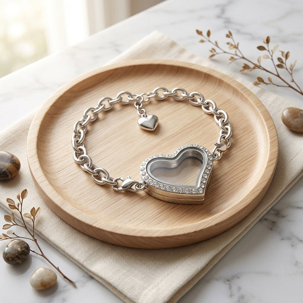 Silver heart-shaped floating charm bracelet on a wooden dish with decorative elements.