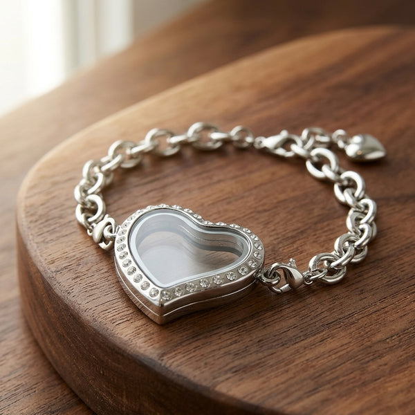 Silver heart-shaped floating charm bracelet on a wooden surface