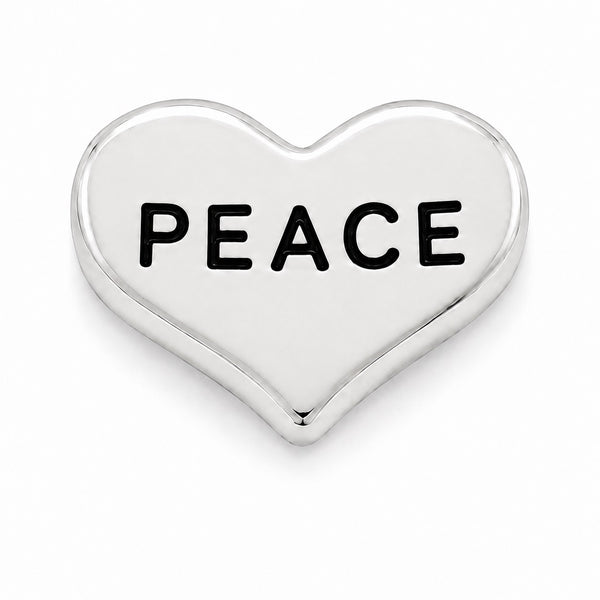 A polished silver heart-shaped Floating charm with the word 'PEACE' in bold black capital letters across the center, shown on a clean white background.