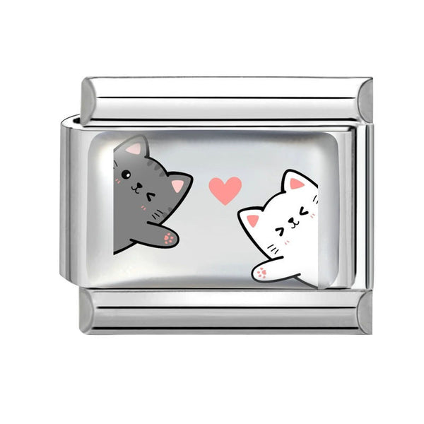 A 9mm Italian charm featuring a glossy insert with a cute cartoon design of a gray cat and a white cat facing each other with a pink heart between them.